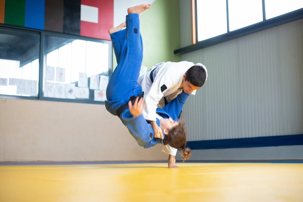 A Judoka Throwing an Opponent